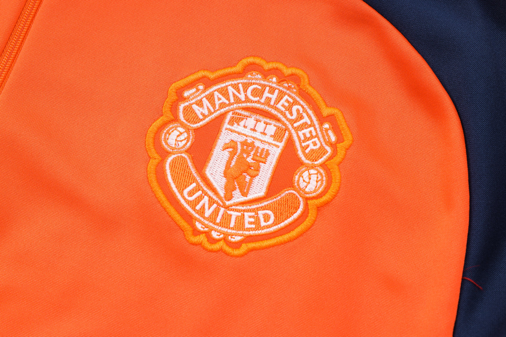 Manchester United Dark Blue and Orange Tracksuit